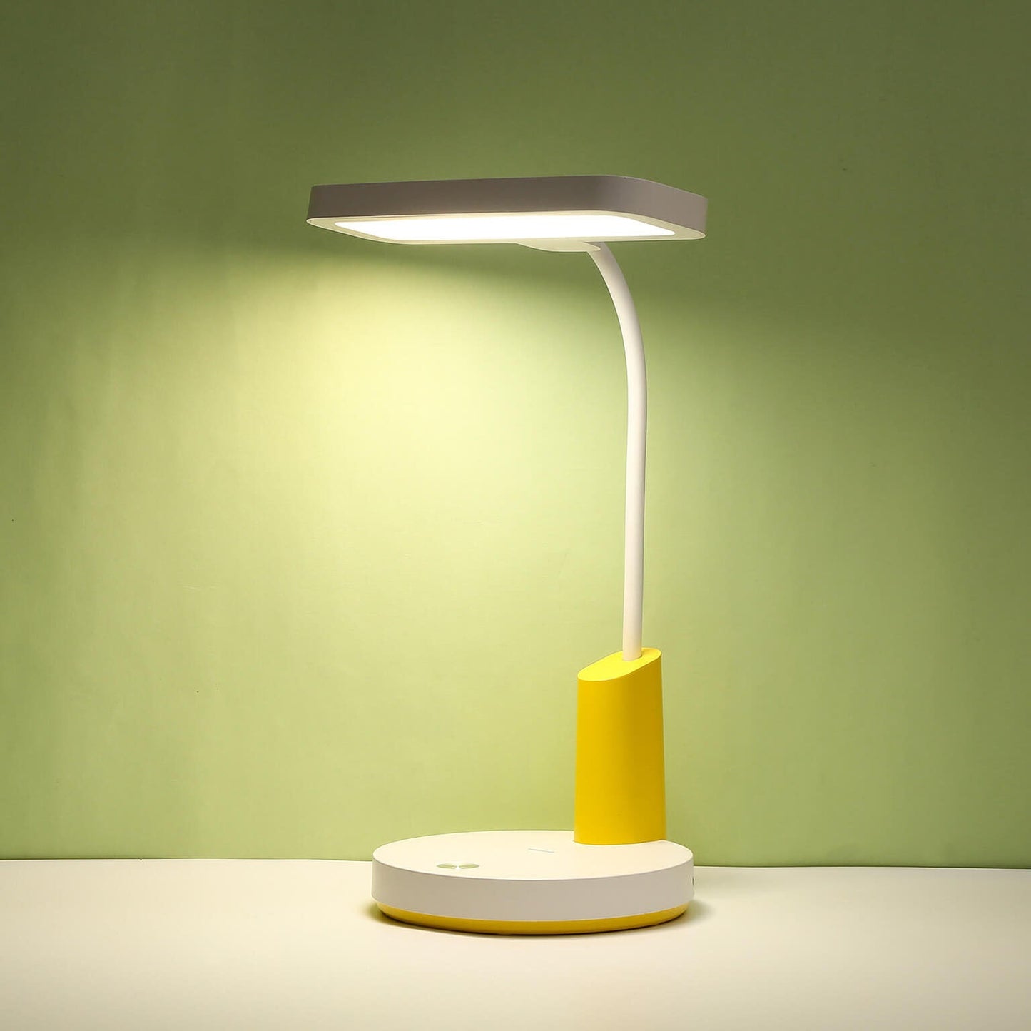 Einfache Long Shadow Round Base Touch Charge LED Desk Lamp
