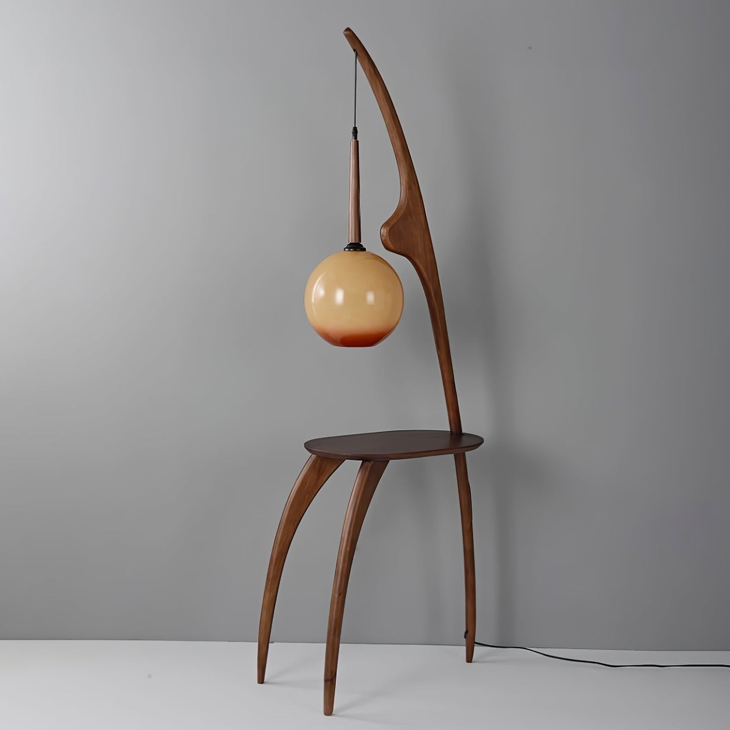 Curved Mantis Arm Floor Lamp with Amber Glass Shade