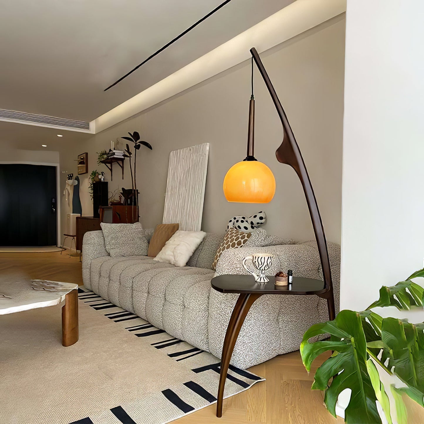 Curved Mantis Arm Floor Lamp with Amber Glass Shade