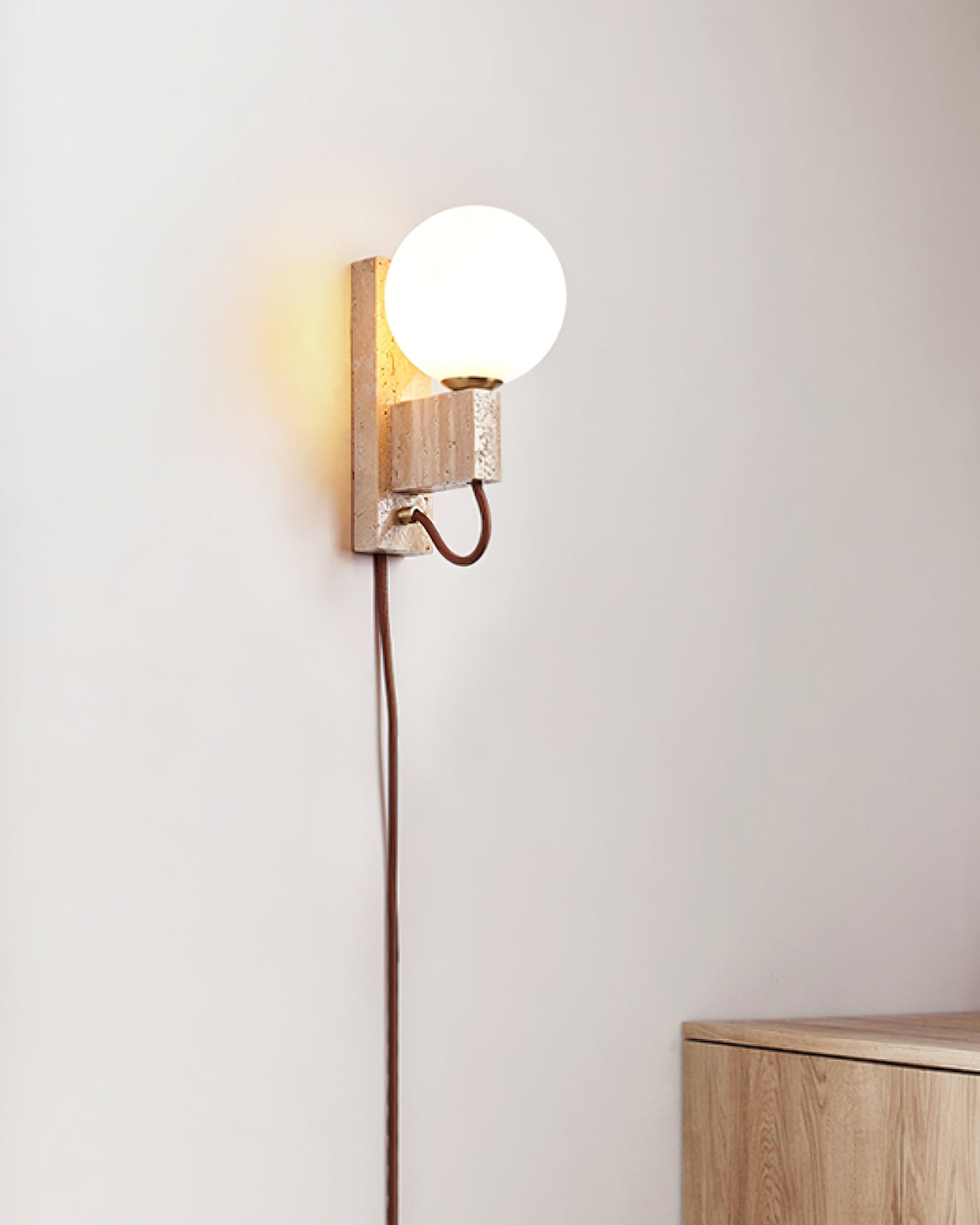 Atlas Globe Wall Sconce with Travertine Base and LED Light