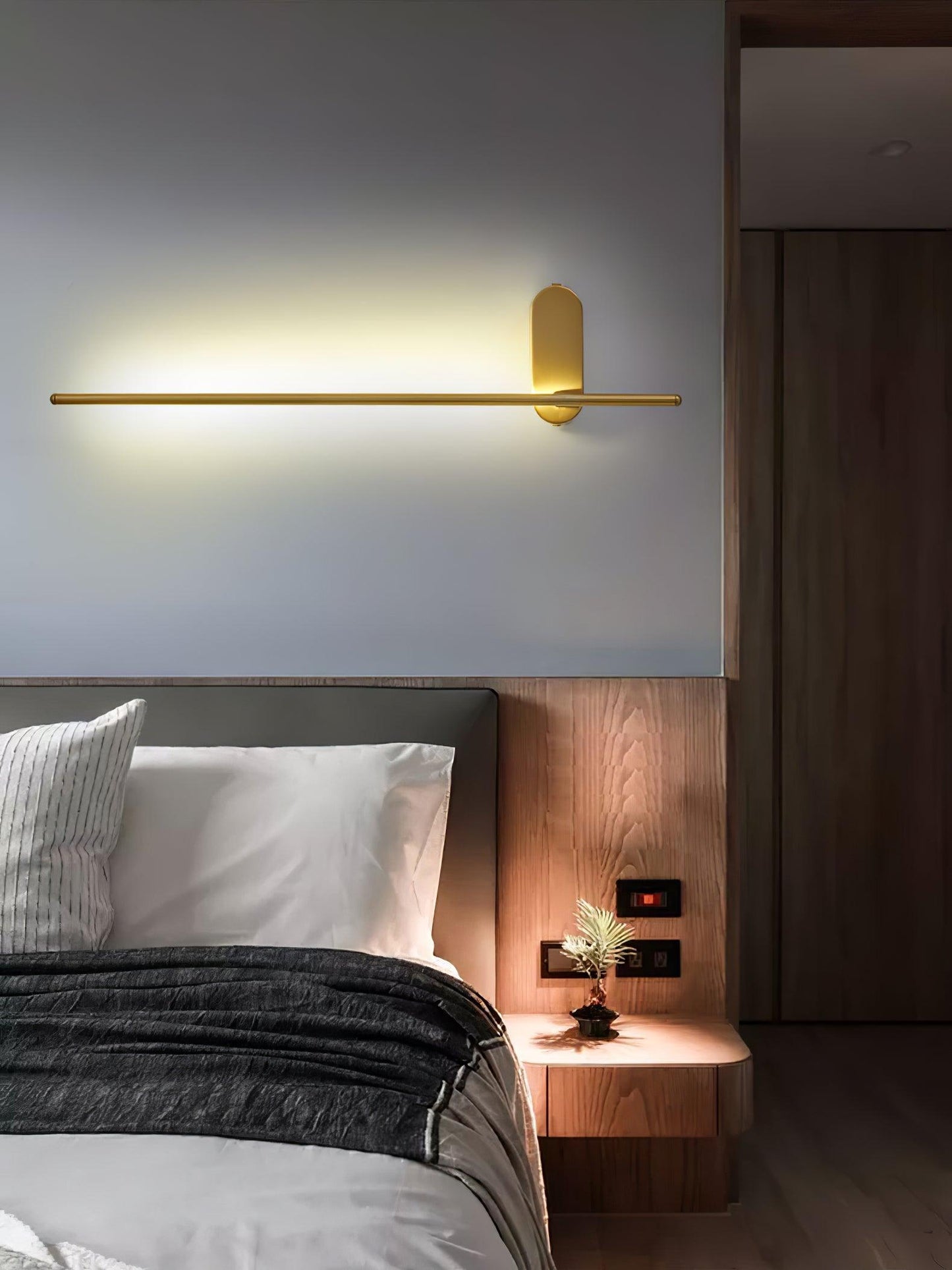 Stick Shaped Plug In Sconce with Integrated LED Lighting