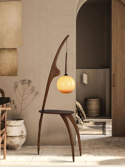 Curved Mantis Arm Floor Lamp with Amber Glass Shade