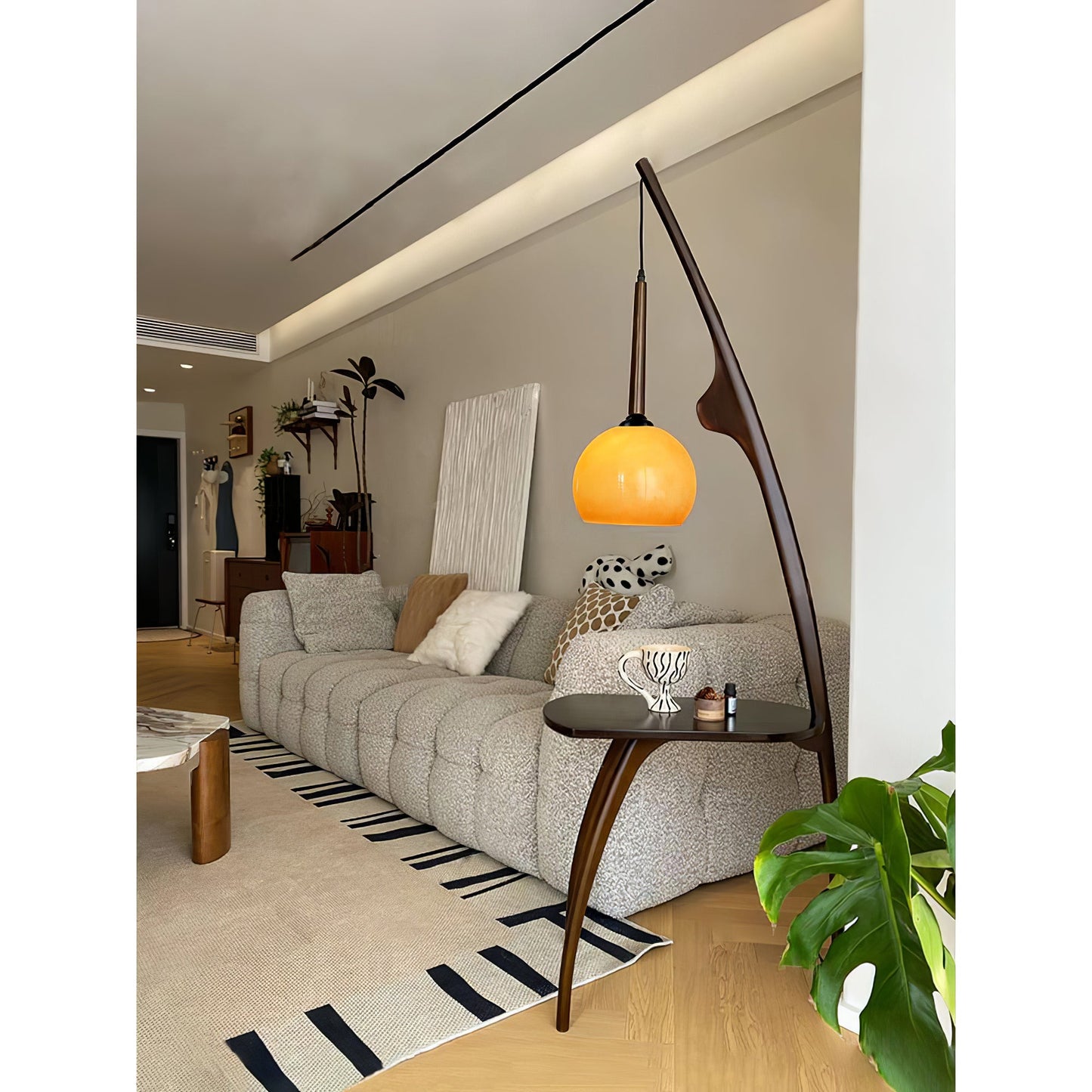 Curved Mantis Arm Floor Lamp with Amber Glass Shade