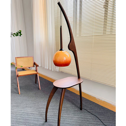 Curved Mantis Arm Floor Lamp with Amber Glass Shade