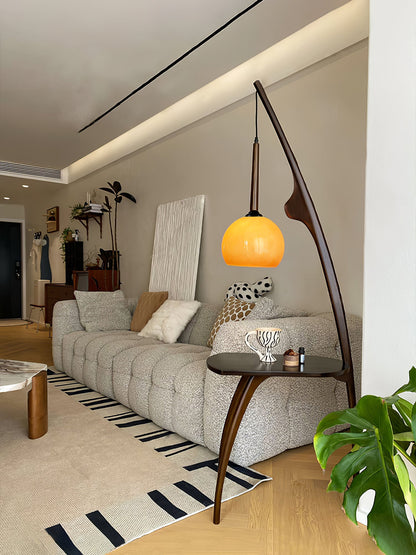 Curved Mantis Arm Floor Lamp with Amber Glass Shade