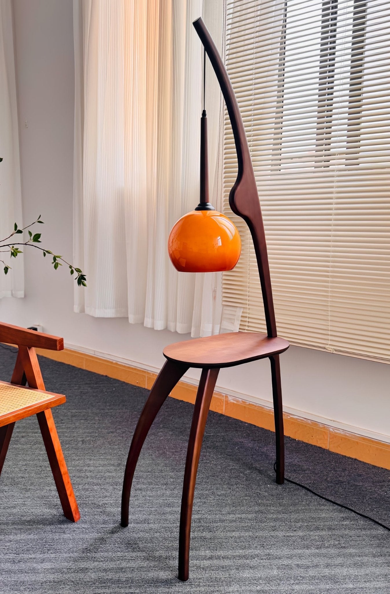 Curved Mantis Arm Floor Lamp with Amber Glass Shade