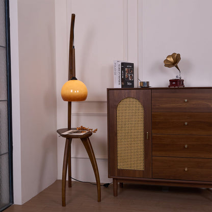 Curved Mantis Arm Floor Lamp with Amber Glass Shade