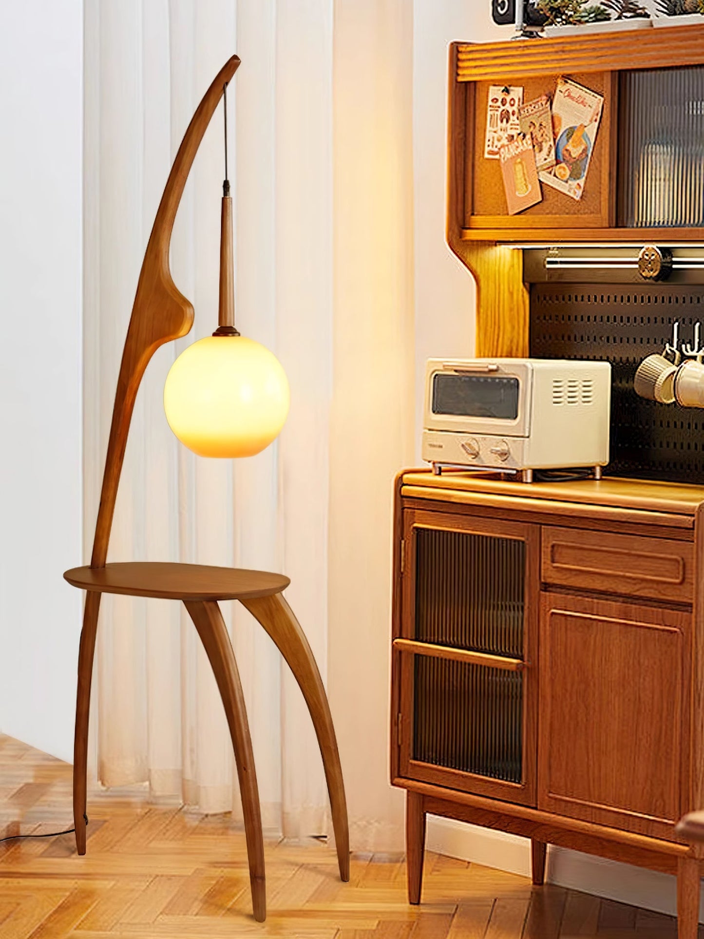 Curved Mantis Arm Floor Lamp with Amber Glass Shade