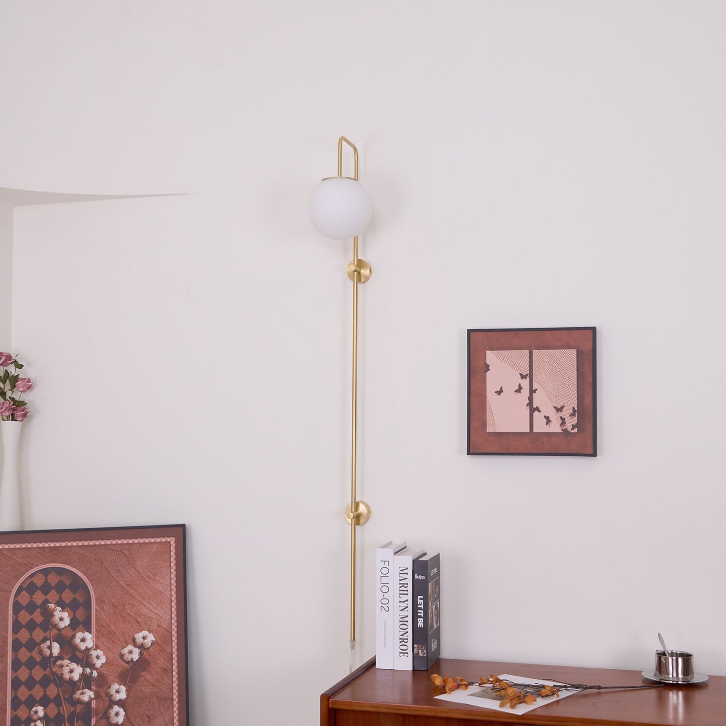 Globe Brass Plug-in Wall Sconce with White Glass Shade