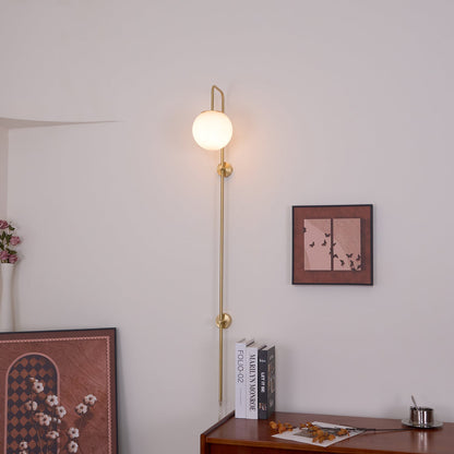 Globe Brass Plug-in Wall Sconce with White Glass Shade