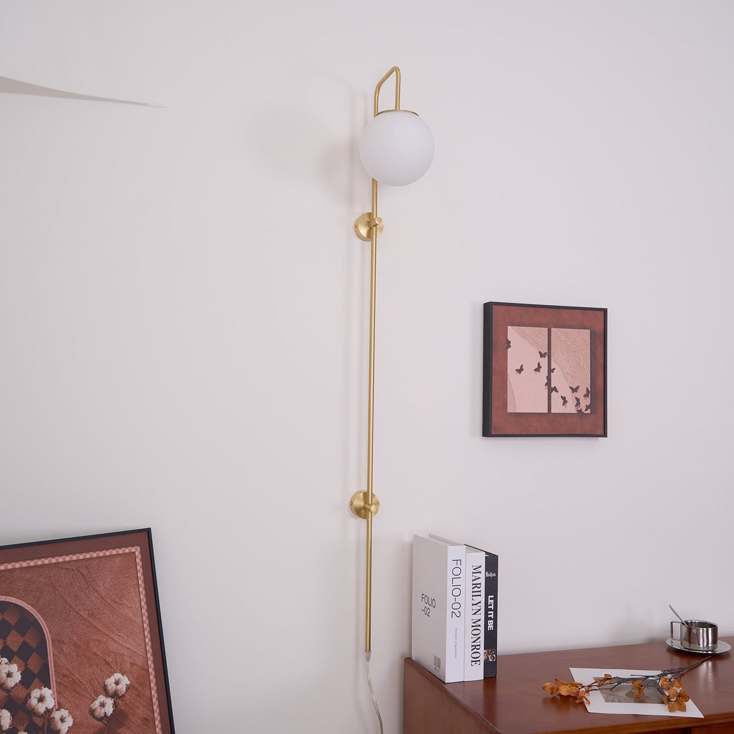 Globe Brass Plug-in Wall Sconce with White Glass Shade