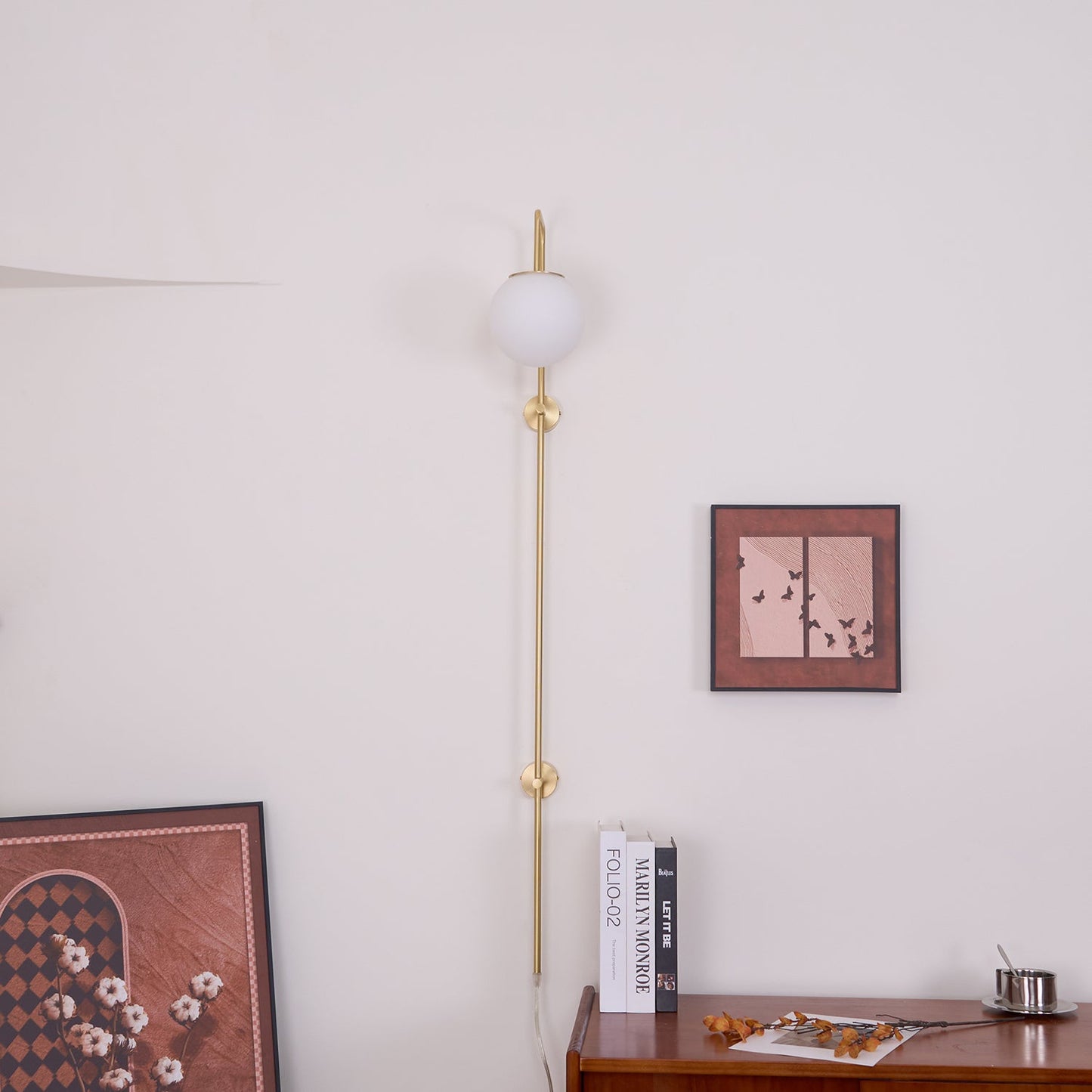 Globe Brass Plug-in Wall Sconce with White Glass Shade