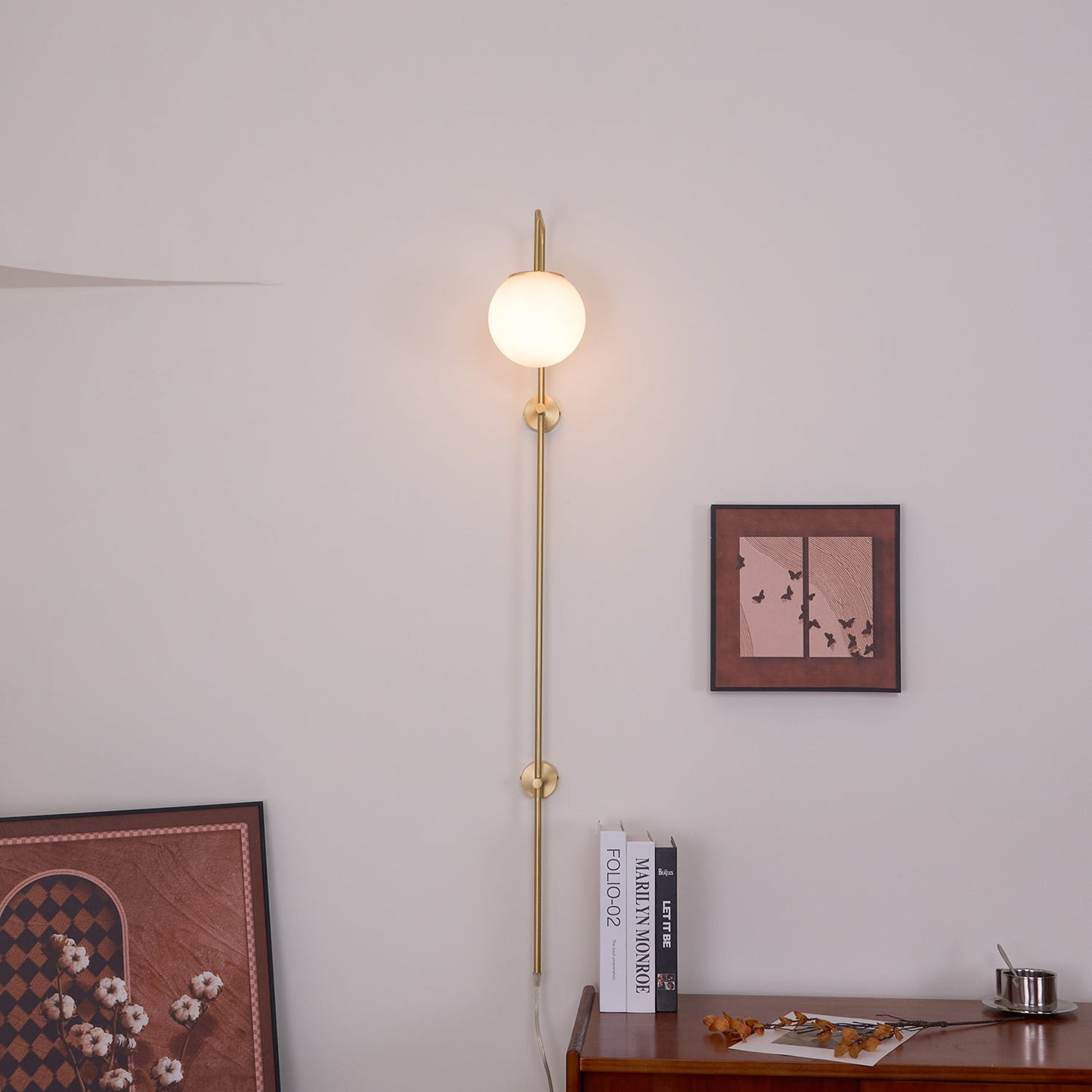 Globe Brass Plug-in Wall Sconce with White Glass Shade