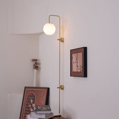 Globe Brass Plug-in Wall Sconce with White Glass Shade
