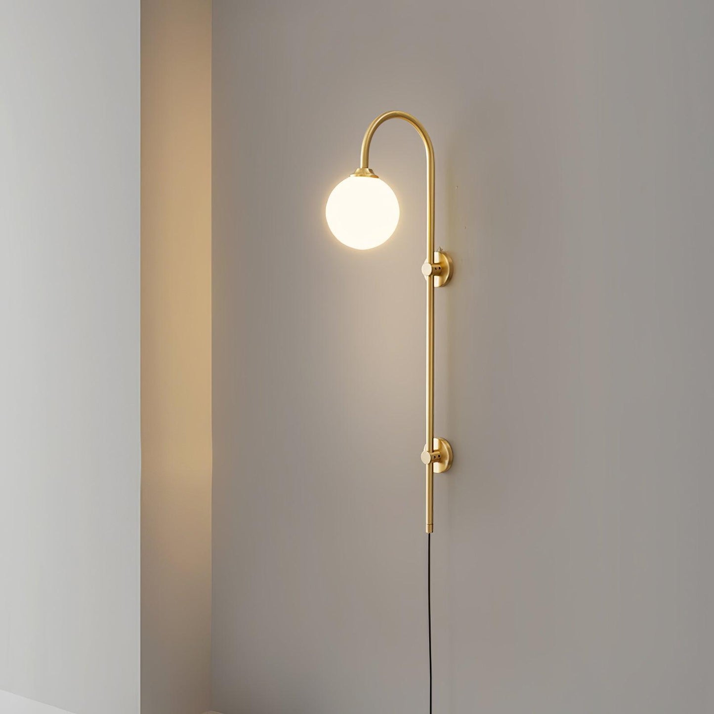 Globe Brass Plug-in Wall Sconce with White Glass Shade