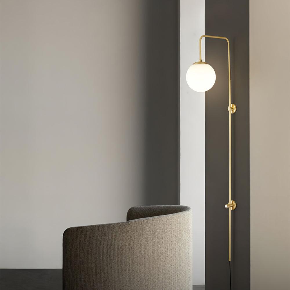 Globe Brass Plug-in Wall Sconce with White Glass Shade