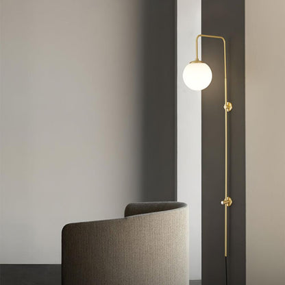 Globe Brass Plug-in Wall Sconce with White Glass Shade