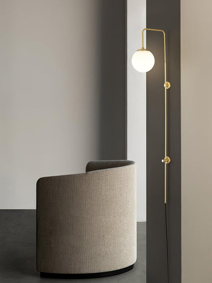 Globe Brass Plug-in Wall Sconce with White Glass Shade