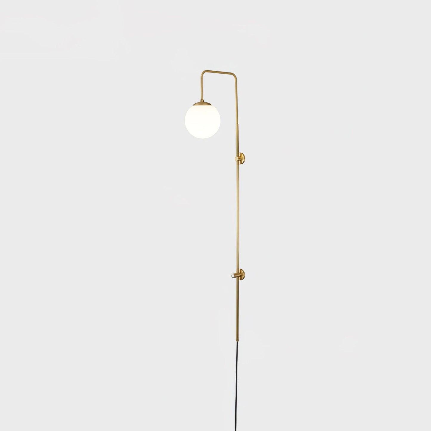 Globe Brass Plug-in Wall Sconce with White Glass Shade