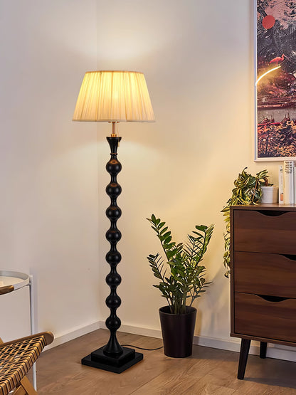 Artemisia Floor Lamp with Sculptural Black Base and White Shade