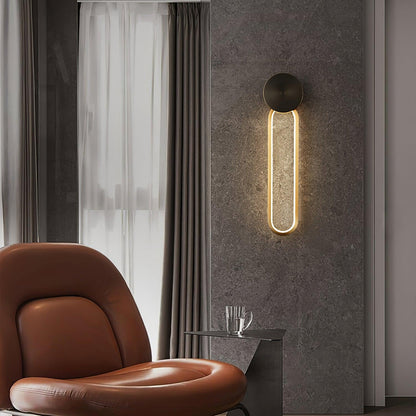 Simple Elliptical Wall Sconce with Integrated LED Lighting